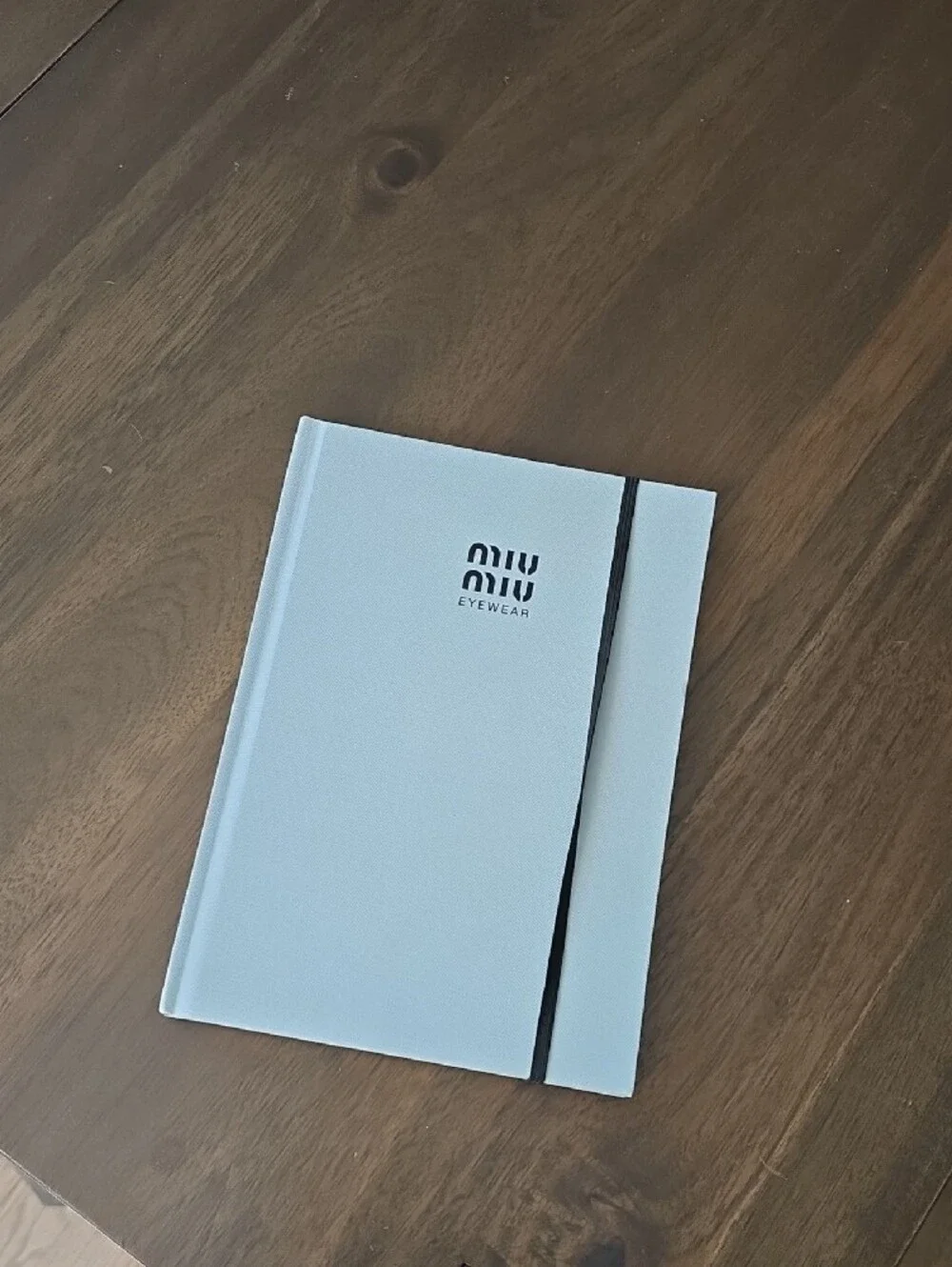 Miu Miu Light Gray Hardcover Notebook with Black Elastic